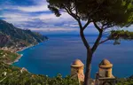 High above the azure seas lies Ravello. Its rooftops touching the sky, its lanes, gardens and villas offering a glimpse of heaven.