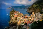 The Cinque Terre area...a destination where huge cliffs rise from azure seas and medieval villages perch on hillsides - embraced by olives groves and vineyards.