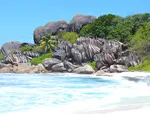 The biggest beach on this Seychelles island - a spectacular stretch of silver sand framed by granite rocks and waving palm trees called Grand Anse Beach