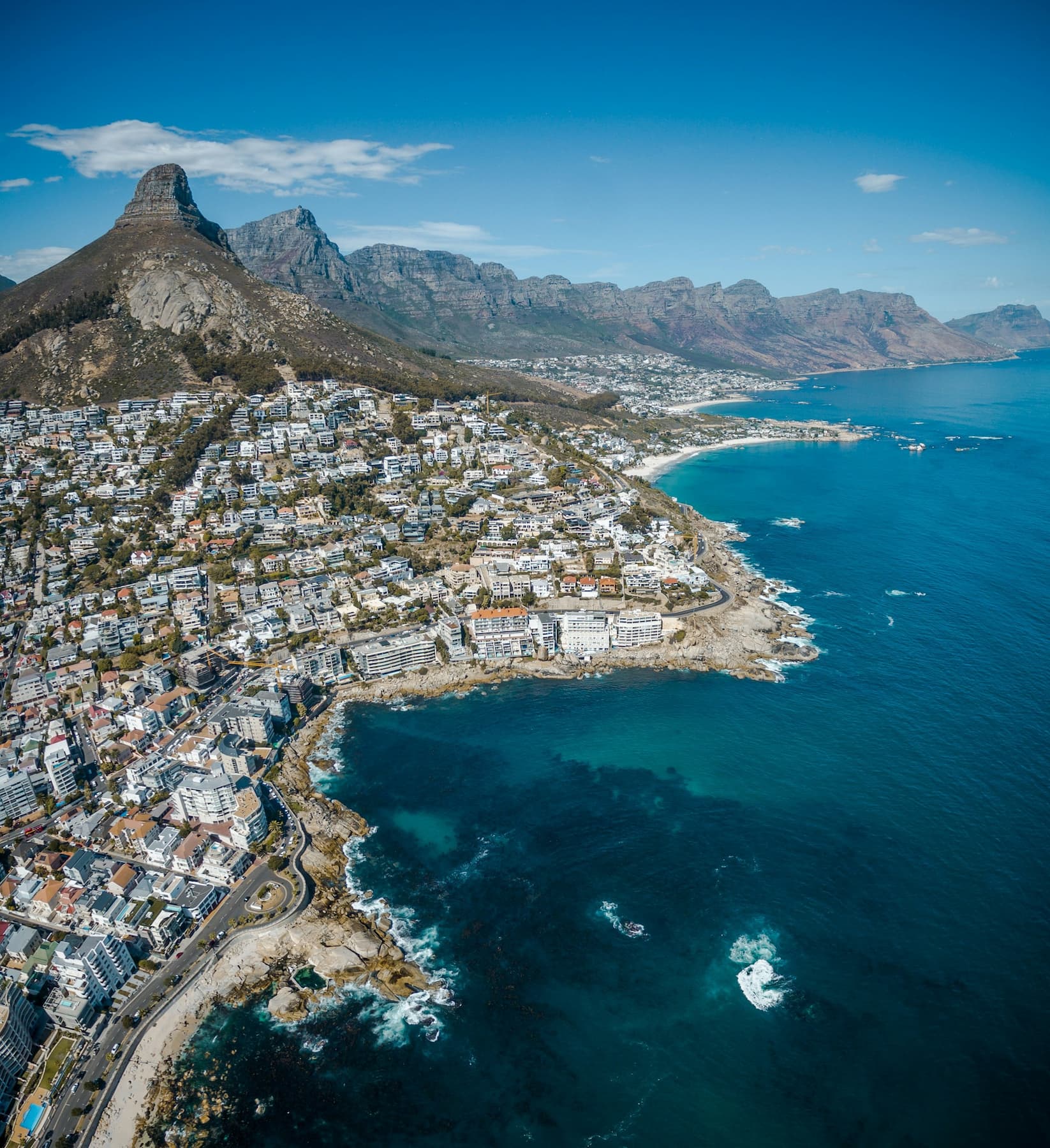 Best places to go in October for sun? 11 Coastal retreats where summer goes on and the crowds have gone Aerial view of Cape Town's Atlantic Seaboard