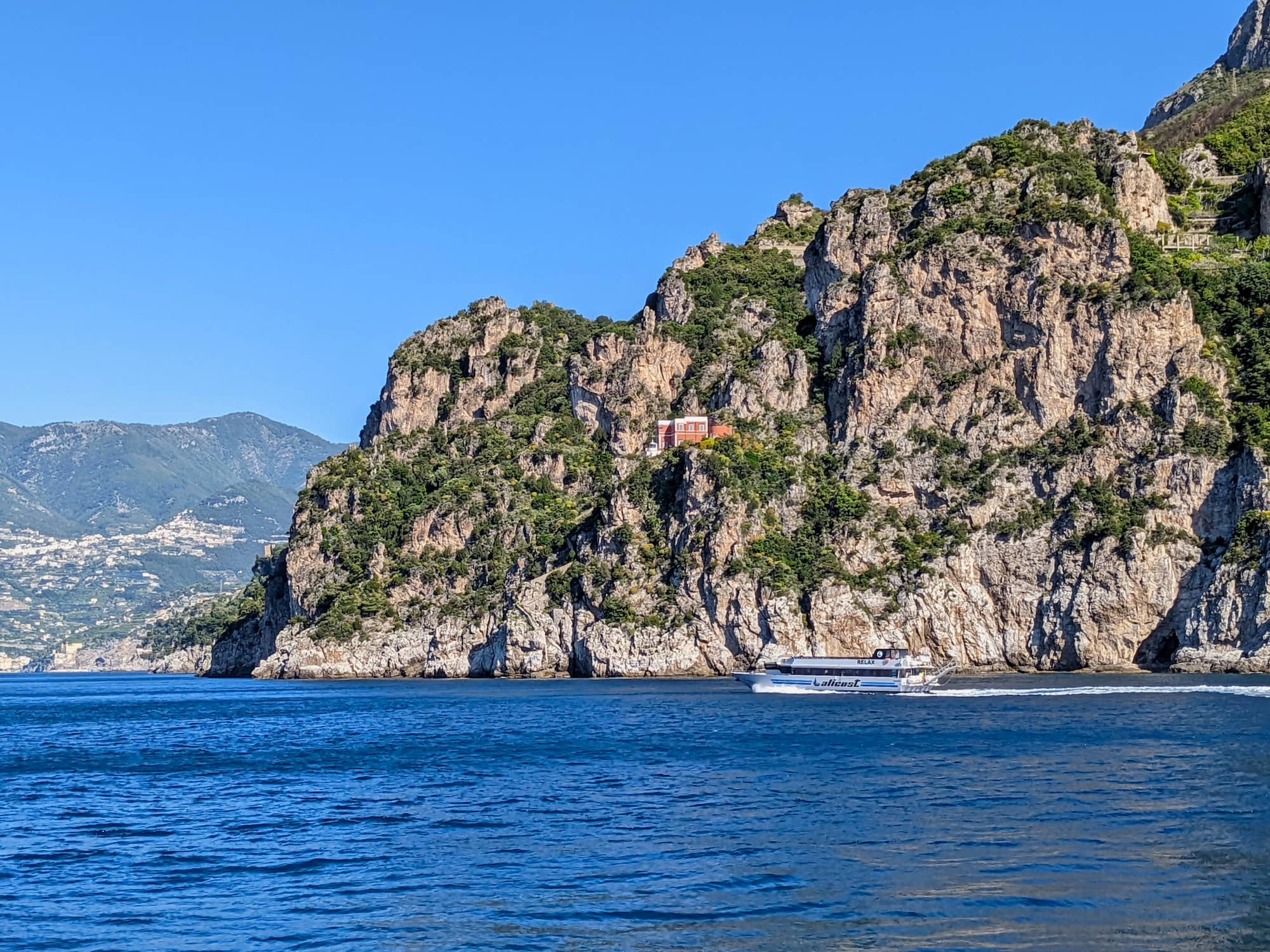 View of the coastline from a ferry traveling along the Amalfi Coast