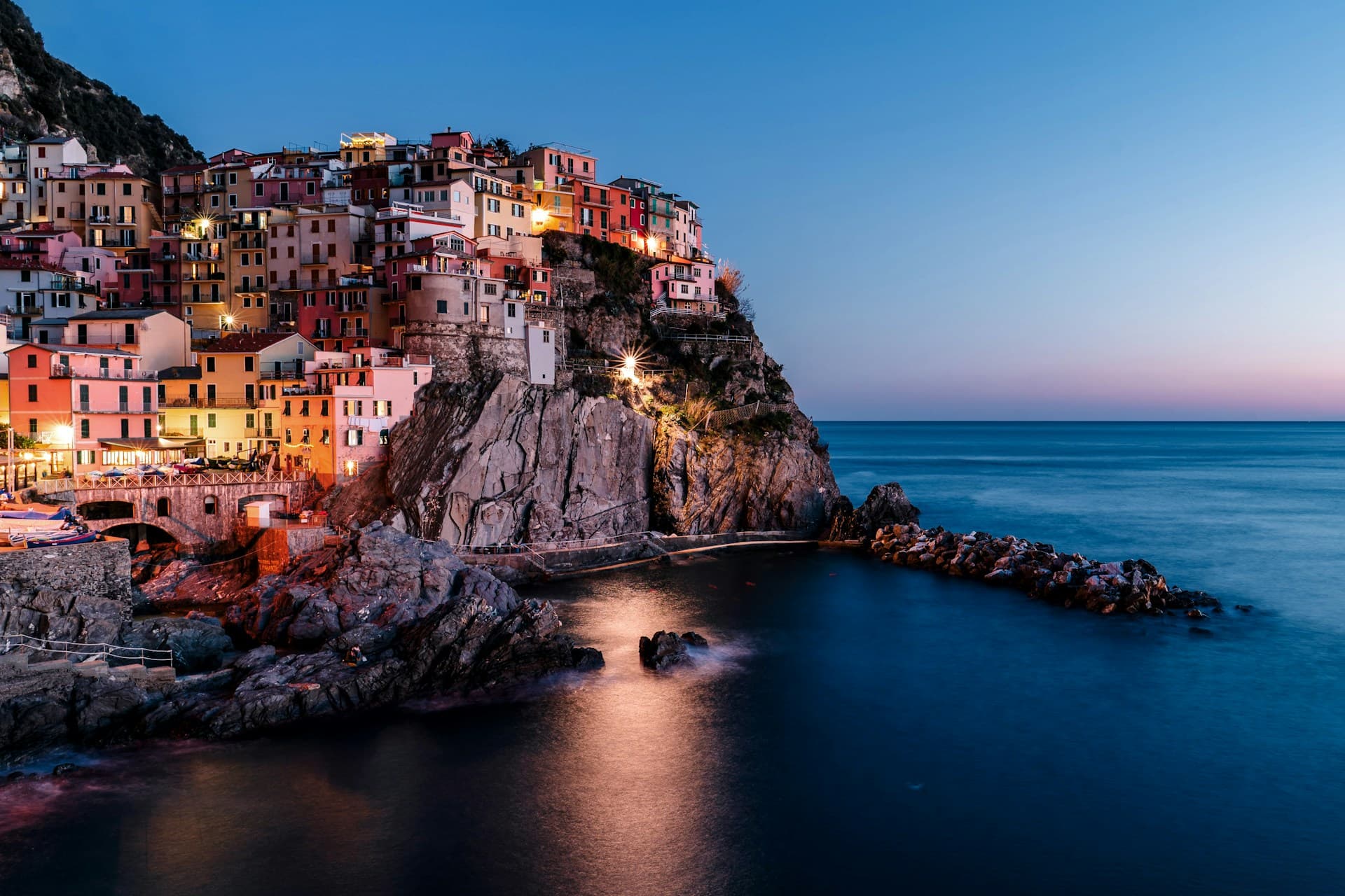Cinque Terre in November: In November the weather can be a bit cool but there's still plenty to enjoy at the start of winter. The town of Manarola at night, Cinque Terre