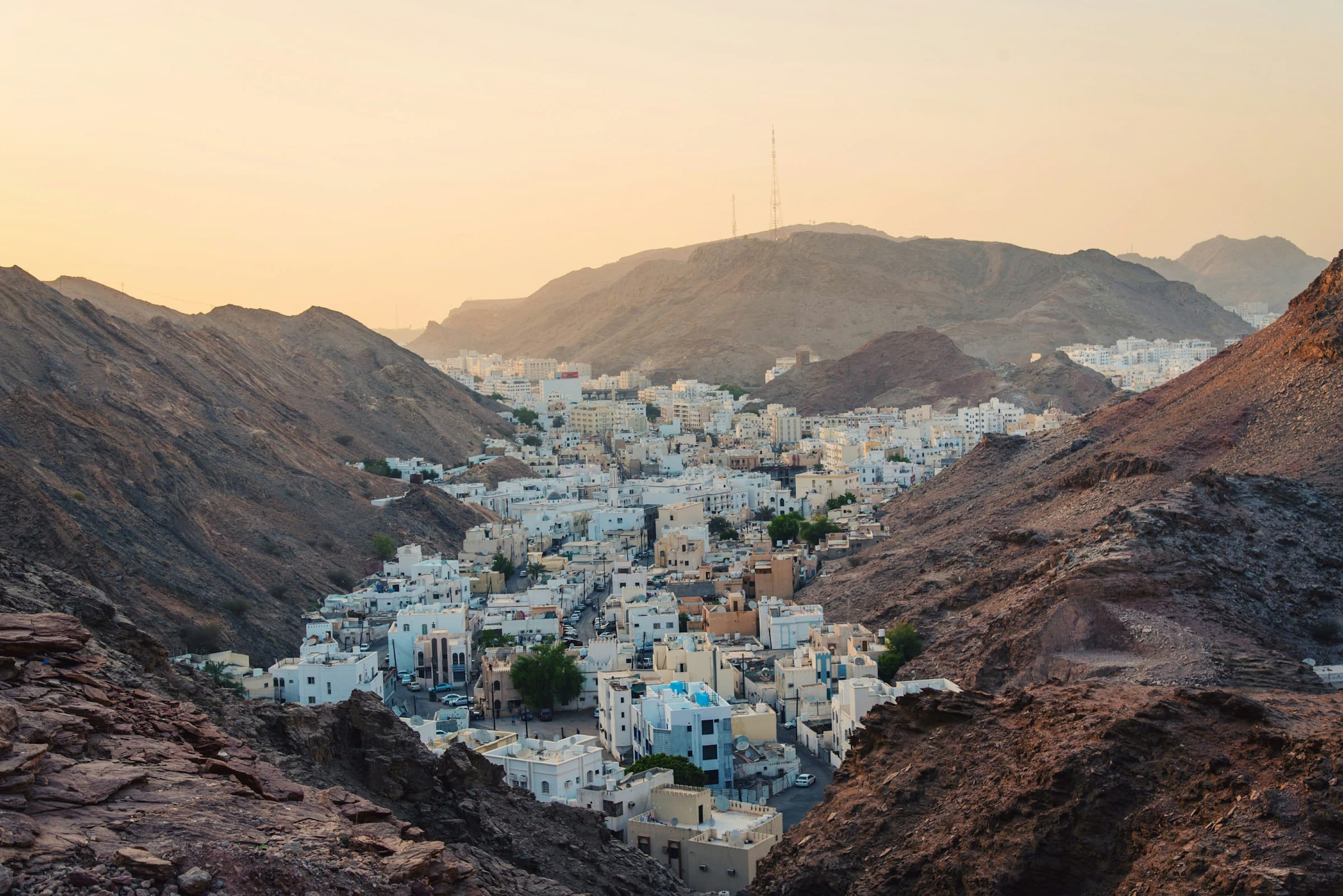 Where to go in October for sun? 11 Coastal retreats where summer goes on and the crowds have gone A mountainous neighborhood of Muscat, Oman
