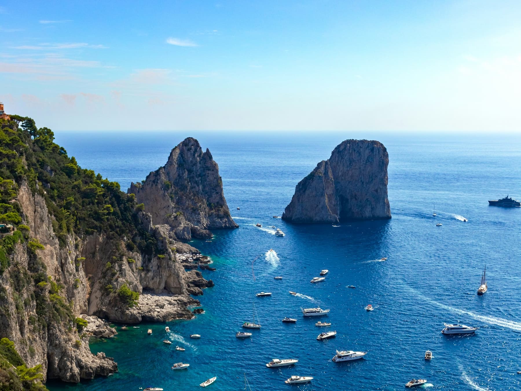 Looking towards the Faraglioni rock formations from the Gardens of Augustus in Capri, Italy