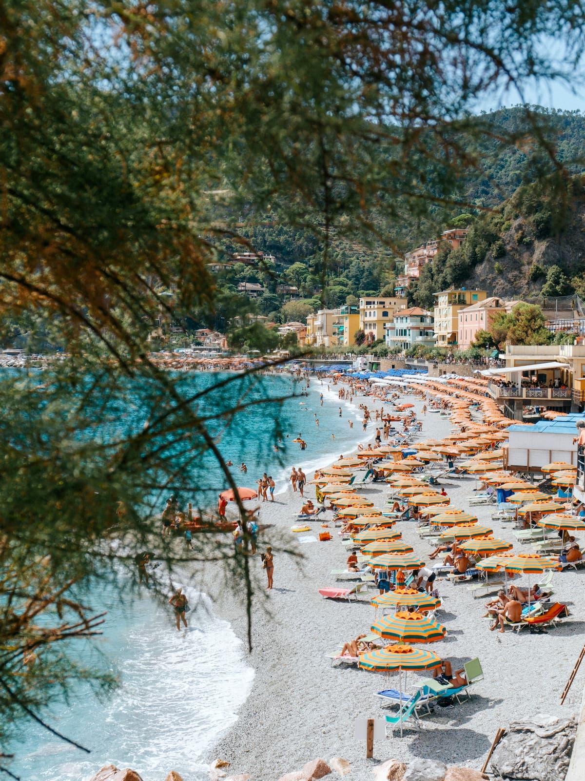 When considering where to stay in Cinque Terre, Monterosso al Mare is a popular option with familes due to its proper long beach, unlike the other Cinque Terre. View of Monterosso al Mare beach